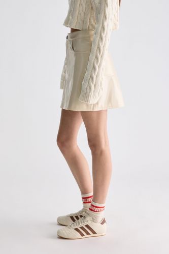 Jupe courte vanille en vinyle BELLEROSE | Marine